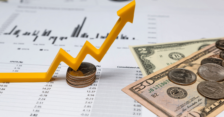 Bond certificates and yield tables on a desk